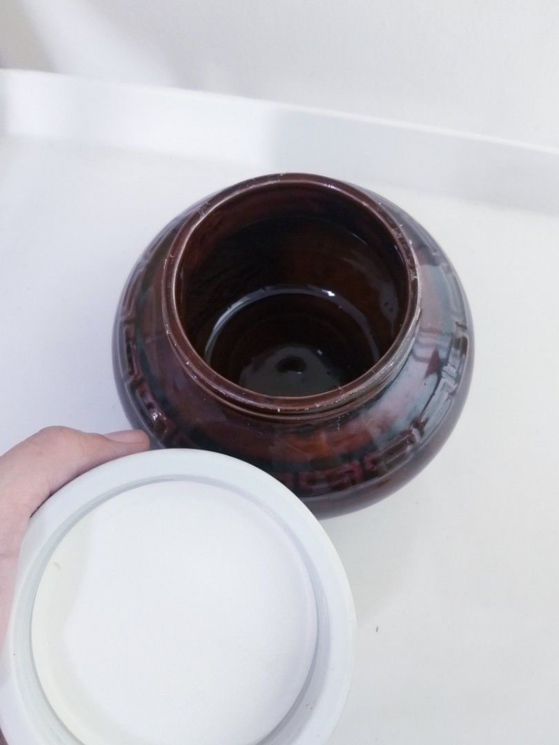 Iridiscent Brown ceramic jar (Category: Food Organization & Storage) located in Cavite. Submitted by wishie_collects (Listing ID 1298890800, Image 2). Description: Iridiscent Brown Storage Jar with airtight Lid For kimchi / pickles garlic or even sugar or milk.