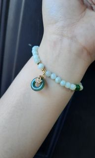 Jadeite jade bracelet with donut charm