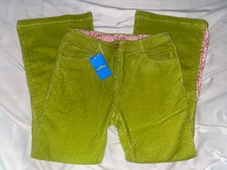 Low waisted lime green corduroy with pink floral detail flare pants