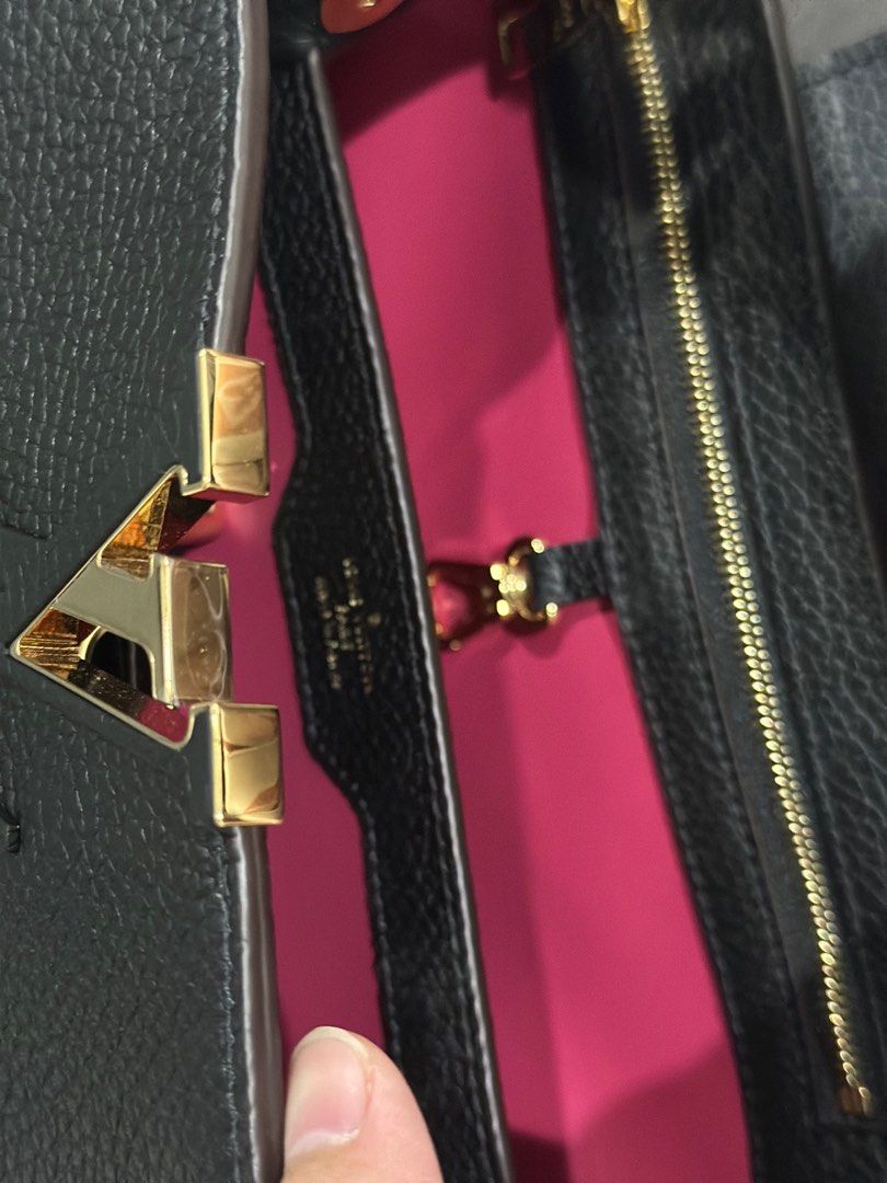 LV Capucine Noir MM w free twilly (Category: Luxury Bags & Wallets) located in Quezon City. Submitted by isabelhdp (Listing ID 1298884486, Image 3). Description: Purchase price of at HK Airport Louis Vuitton Capucine MM size Bag is made with Taurillon leather, comes with receipt, free twilly band all original For pick ups in Quezon City only.