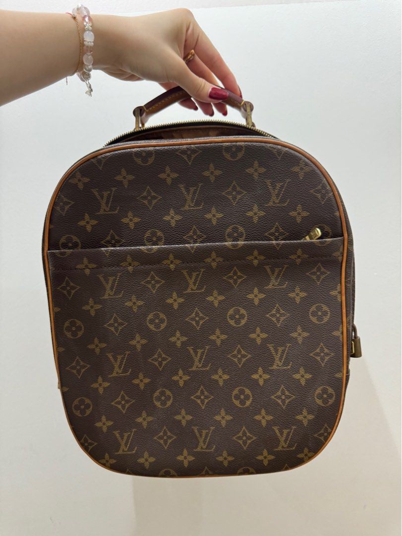Louis vuitton one strap backpack shop