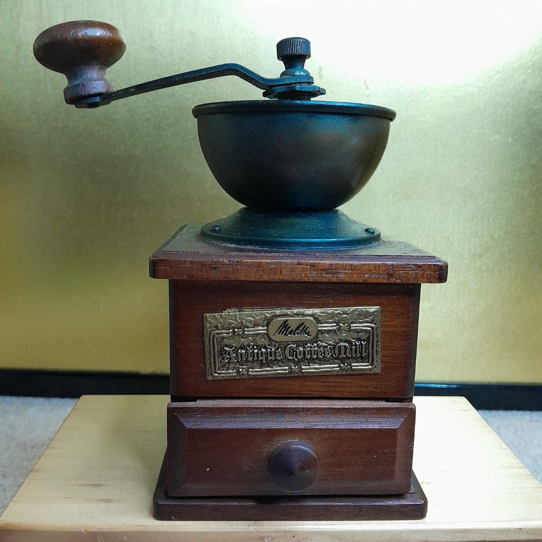 MELITTA ANTIQUE COFFEE MILL (ROTATING-MANUAL) (Category: Coffee Machines & Makers) located in Bulacan. Submitted by sakurajade (Listing ID 1298837029, Image 2). Description: MELITTA ANTIQUE COFFEE MILL (ROTATING-MANUAL) 👉 Price: P900 ONLY ✅️ Good condition, as good as new, metal mechanism with wood handle, traditonal bean grinder, brand: Melitta ✅️ Material: Metal, wood ✅️ Issue: As-is, no box, need clean, with signs of usage.