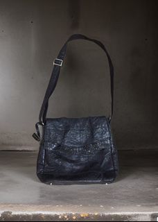 Ostrich leather sling bag