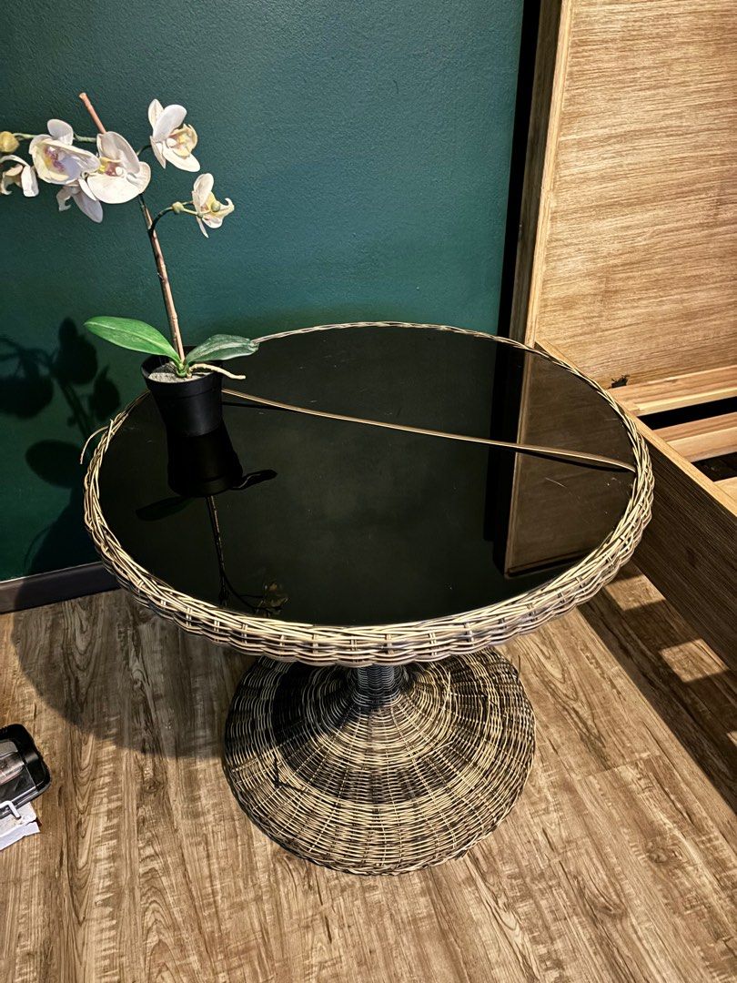 Round side table (Category: Tables & Sets) located in Singapore. Submitted by aniq35 (Listing ID 1298913612, Image 1). Description: SELLING CHEAP! Round side table still in good sturdy condition only some of the rattan coming out as seen in picture..