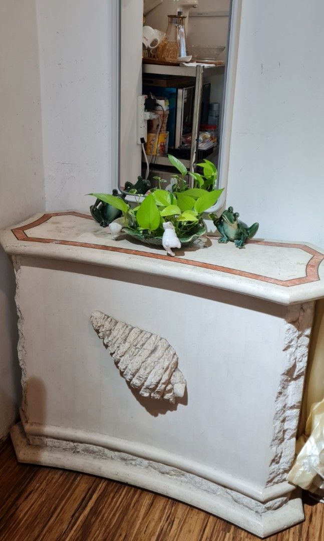 Solid marble table (Category: Shelves, Cabinets & Racks) located in Singapore. Submitted by genjeff (Listing ID 1298886748, Image 1). Description: imported from Europe antique table with seashell design. Heavy item ,moving out sale !.