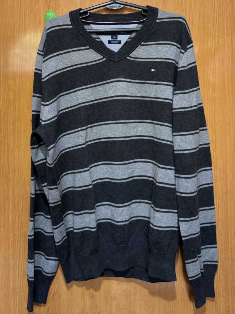 Tommy Hilfiger Thin Knitted Striped Sweater (Category: Coats, Jackets and Outerwear) located in Pasig City. Submitted by dranier (Listing ID 1298861234, Image 1). Description: Tommy Hilfiger Thin Knitted Striped Sweater V Neck Size Medium 27x23.