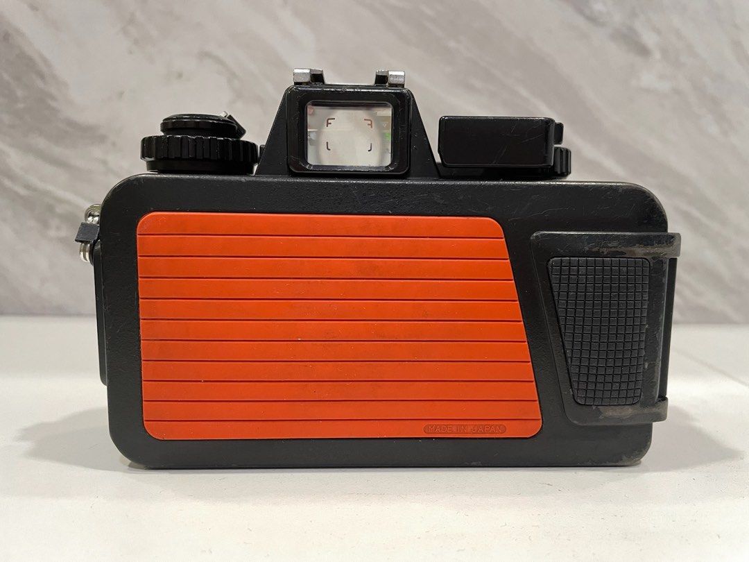 Diving with a Nikonos underwater film camera in 2022