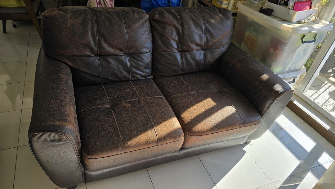 [Used] Mandaue Foam Hervey 2 seater sofa (Category: Sofas) located in Pasig City. Submitted by spaceshift (Listing ID 1298869207, Image 1). Description: !!! Repriced. Selling low !!! Made to order 2 seater sofa. Well used, only flaw is the leather cover peeling already. The foams and frames are still intact. LWH = 155cm x 95cm x 87cm rfs: home makeover.