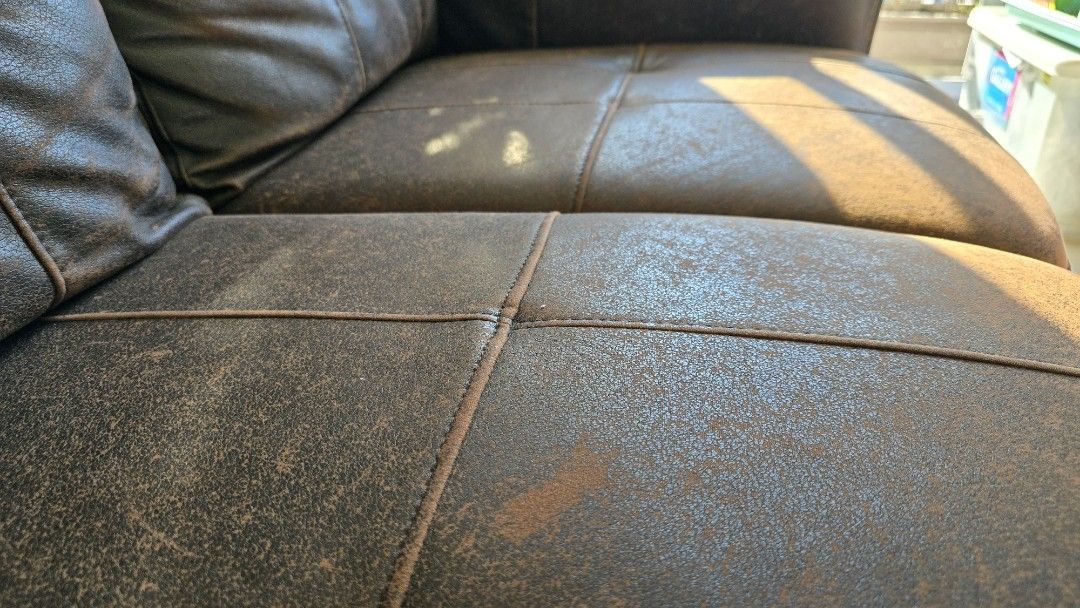 [Used] Mandaue Foam Hervey 2 seater sofa (Category: Sofas) located in Pasig City. Submitted by spaceshift (Listing ID 1298869207, Image 2). Description: !!! Repriced. Selling low !!! Made to order 2 seater sofa. Well used, only flaw is the leather cover peeling already. The foams and frames are still intact. LWH = 155cm x 95cm x 87cm rfs: home makeover.