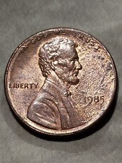 1985 Lincoln cent strike through grease error coin