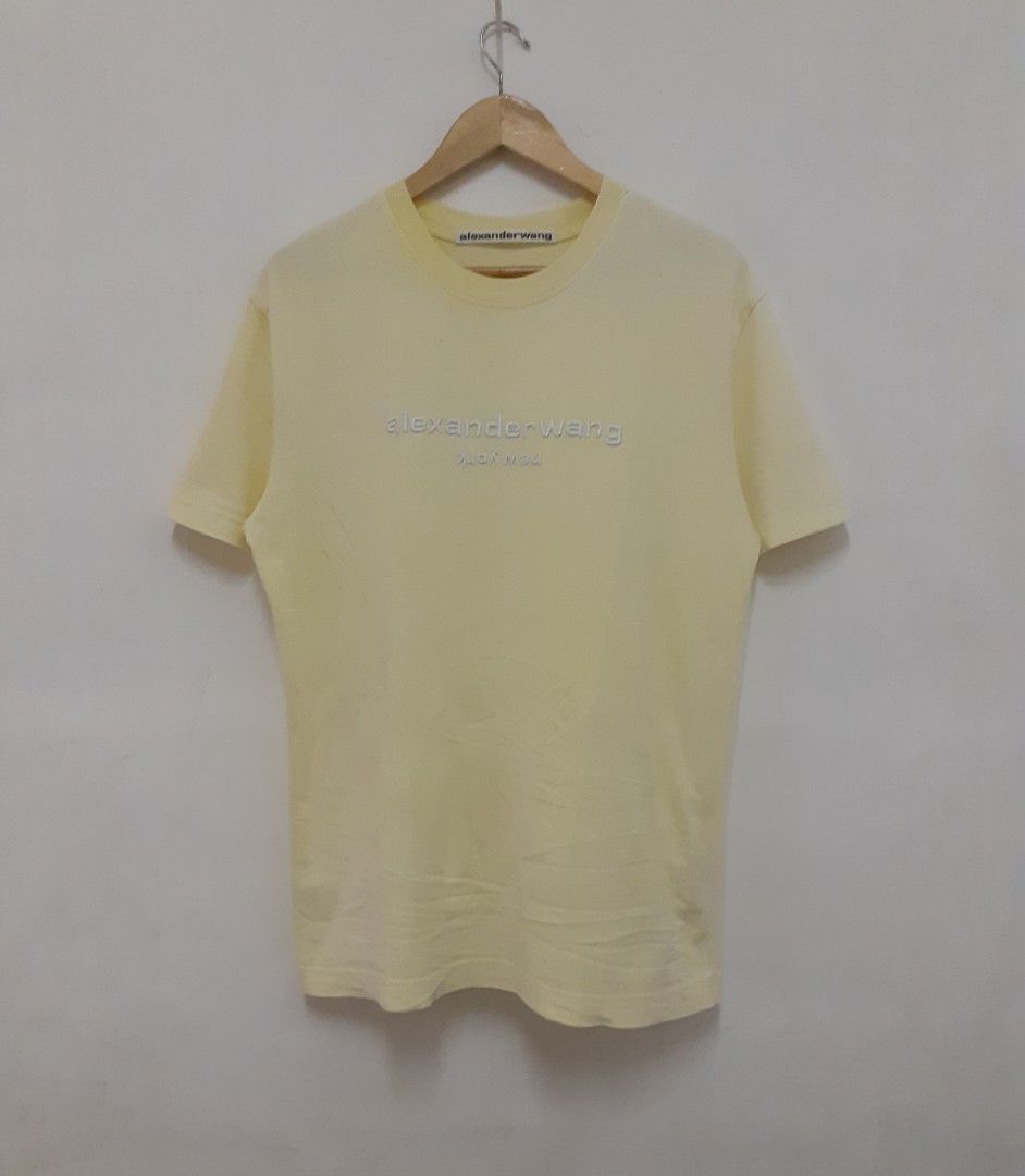 ALEXANDER WANG LIGHT YELLOW EMBROID CREWNECK TSHIRT (Category: Luxury Apparel) located in Navotas City. Submitted by riyuwi (Listing ID 1299053625, Image 1). Description: PREOWNED lightly Used AUTHENTIC ALEXANDER WANG EMBROID LiGHT YELLOW CREWNECKLINE TSHIRT Small on tag fits LARGE FRAME Cotton Good Condition 9/10.