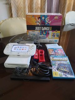 Complete Nintendo Wii U console, in box, with 2 games