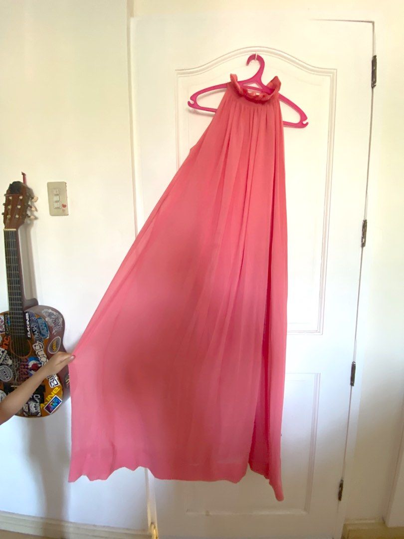 High Neck Flowy Maxi Dress (Category: Evening dresses & gowns) located in Paranaque City. Submitted by yard_army (Listing ID 1299019495, Image 2). Description: Bought at local mall Size M-L High Neck Ruffle Design, flowy skirt Ribbon tie at the back of neck 53”length approx from shoulder down Nice salmon color Perfect for wedding guests and other formal events.