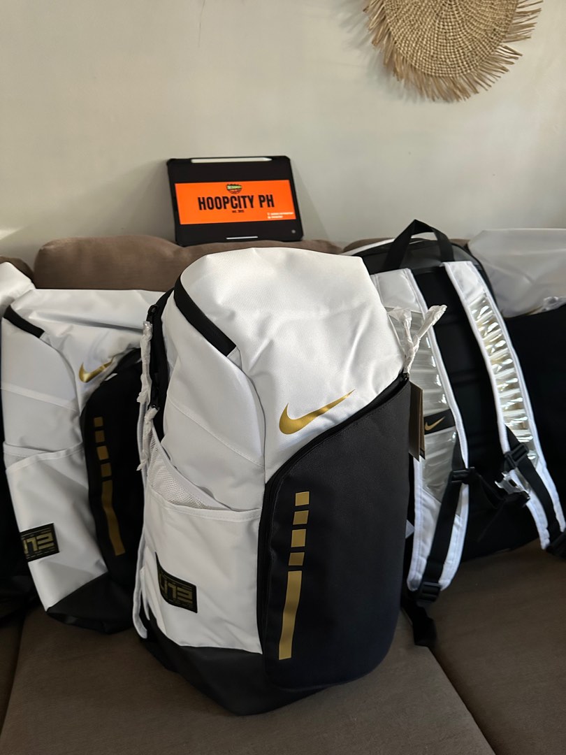 White and gold nike backpack discount