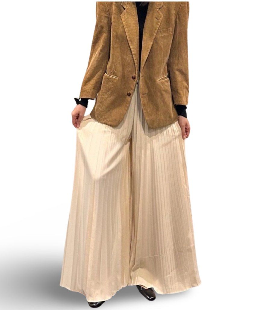 Stunning Pleated Palazzo Trousers (Category: Other Bottoms) located in Makati City. Submitted by cpicks_ph (Listing ID 1299041750, Image 2). Description: Beautiful Pleated Palazzo Pants in Cream Fits S Frames Excellent Condition Lxw: 41” x 24-28” waist.
