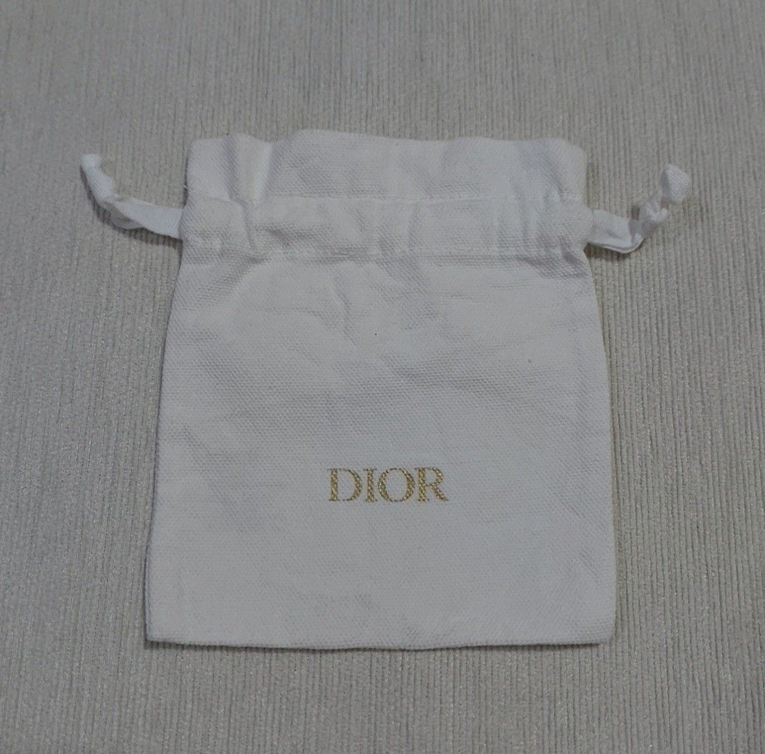 Authentic Christian Dior Dust bag 6x5 inches (Category: Luxury Bags & Wallets) located in Manila. Submitted by jfluxury.co (Listing ID 1296296400, Image 2). Description: excellent condition no flaws bought in Japan 🇯🇵 💯% Authentic. 😊 Money back guarantee. 😊 Clean and ready to use na po.