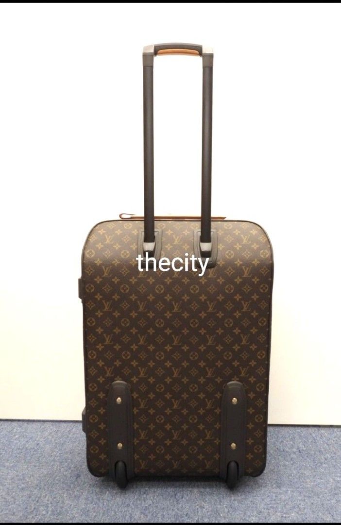 Louis vuitton luggage used on sale