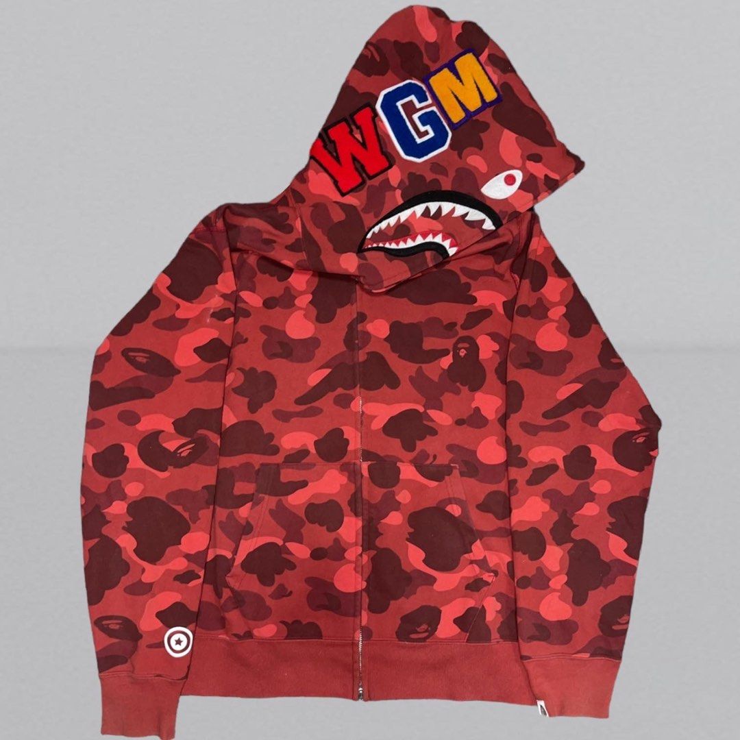 Bape Red Camou Full Zip (Category: Coats, Jackets and Outerwear) located in Makati City. Submitted by unclesource (Listing ID 1296363098, Image 2). Description: Mint condition 28” x 22.8” Neglible glue stain at cuffs .