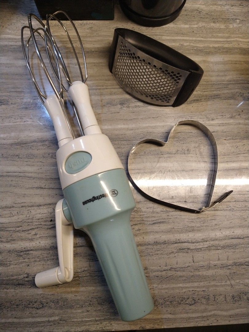 Bundle pack kitchen tools (Category: Cookware & Accessories) located in Manila. Submitted by PickClickShip (Listing ID 1296313022, Image 1). Description: Bundle pack Kitchen tool for sale -Very slightly used (1x use only) - items include 1x onion and veg chopper(plastic body, blades stainless), 1x Westinghouse manual mixer,1 garlic presser, 1x egg heart shaper RFS: decluttering.