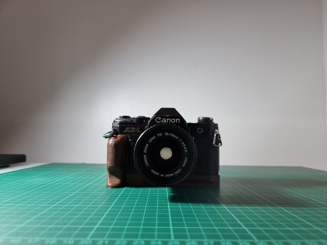 Canon AE-1 (Category: Cameras) located in Las Pinas. Submitted by qwjax (Listing ID 1296279302, Image 1). Description: Black edition As is condition Freebies: Canon 35-70 f/3.5-4.5 Camera grip.