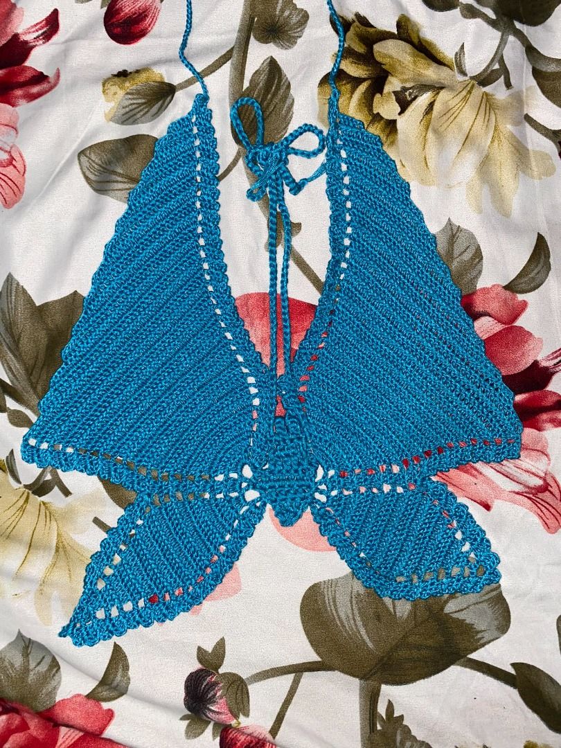 Crochet Butterfly Top (Category: Others Tops) located in Davao. Submitted by purple_stitch87 (Listing ID 1296250685, Image 1). Description: Introducing the enchanting Crochet Blue Butterfly Halter Top, an exquisite addition to your summer wardrobe, destined to elevate your OOTD (Outfit of the Day) game with its delicate charm and vibrant hue. Handcrafted with meticulous attention to detail, this halter top features a mesmerizing butterfly motif t