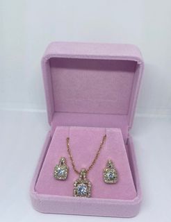 Studded gold jewelry set with jewelry box