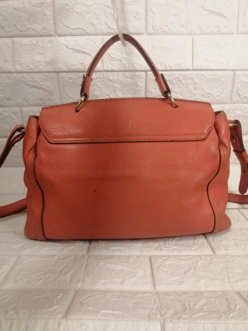 MCM Munchen 2-way Leather Satchel Bag (Category: Luxury Bags & Wallets) located in Las Pinas. Submitted by etoksi1234 (Listing ID 1296380319, Image 2). Description: Pre-loved MCM Munchen 2-way Leather Satchel Bag. With minimal signs of usage please zoom in photos for reference. Size: L-14" x H-10" x D-4.5" Please manage your expectations. All sales are final. Kindly examine pictures carefully when buying online. No return, exchange policy..
