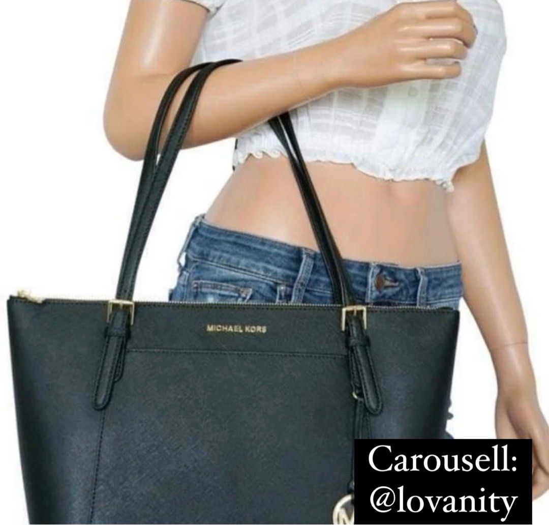 Michael Kors Tote Bag (Category: Luxury Bags & Wallets) located in Manila. Submitted by lovanity (Listing ID 1296398206, Image 1). Description: ✨Authentic Michael Kors Ciara East West Top Zip Tote✨ Good as new, well-maintained Rfs: Decluttering Price negotiable.