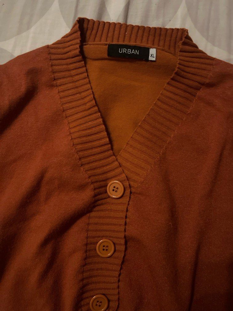 Orange Fall Cropped Cardigan (Category: Longsleeves) located in Quezon City. Submitted by nekes7 (Listing ID 1296373906, Image 3). Description: Only used 2 times. Bought this at 699. Brand: SM deptstore URBAN. This is a cropped cardigan top..