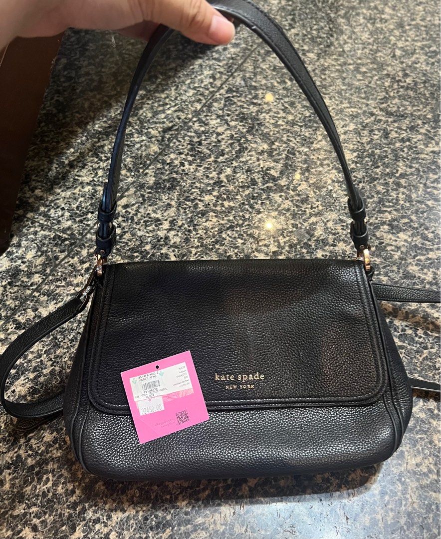 Orig Kate Spade Bag *Repriced (Category: Luxury Bags & Wallets) located in Bacoor. Submitted by juneysells (Listing ID 1296400783, Image 1). Description: like my other postings all posted bags are original unless stated na hindi po. i kept pa pala yung tag ng bag so as you can see i bought it for 22k plus if i rem it right sa rustans glorieta yan partida sale pa yang 22k hehe selling it very low kasi im not using it anymore and ayoko na hehe the 