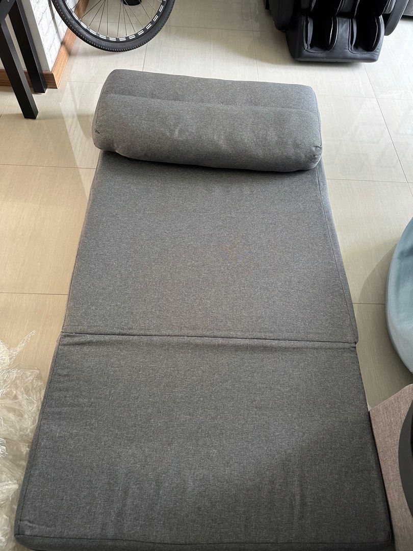 Sofa Bed (Category: Sofas) located in Singapore. Submitted by mumbojumbo111111 (Listing ID 1296310896, Image 2). Description: Foldable lazy sofa bed. 220cm length when fully extended, width is 85cm. In good condition as it is rarely used. Original price is $149.