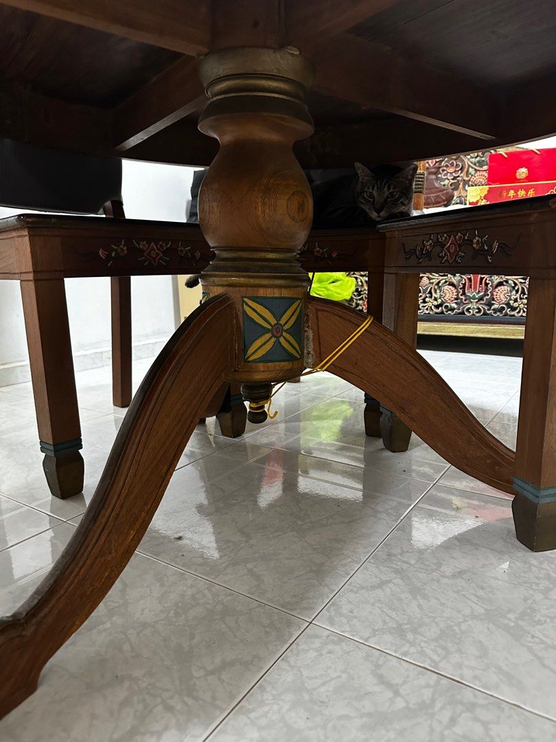 Solid Wood Dining Table (Category: Tables & Sets) located in Singapore. Submitted by whimtickle (Listing ID 1296290820, Image 3). Description: Need to fix the table base to get it balance. Still using it despite being slanted at one side. Table is made of solid teak wood. Only selling table..