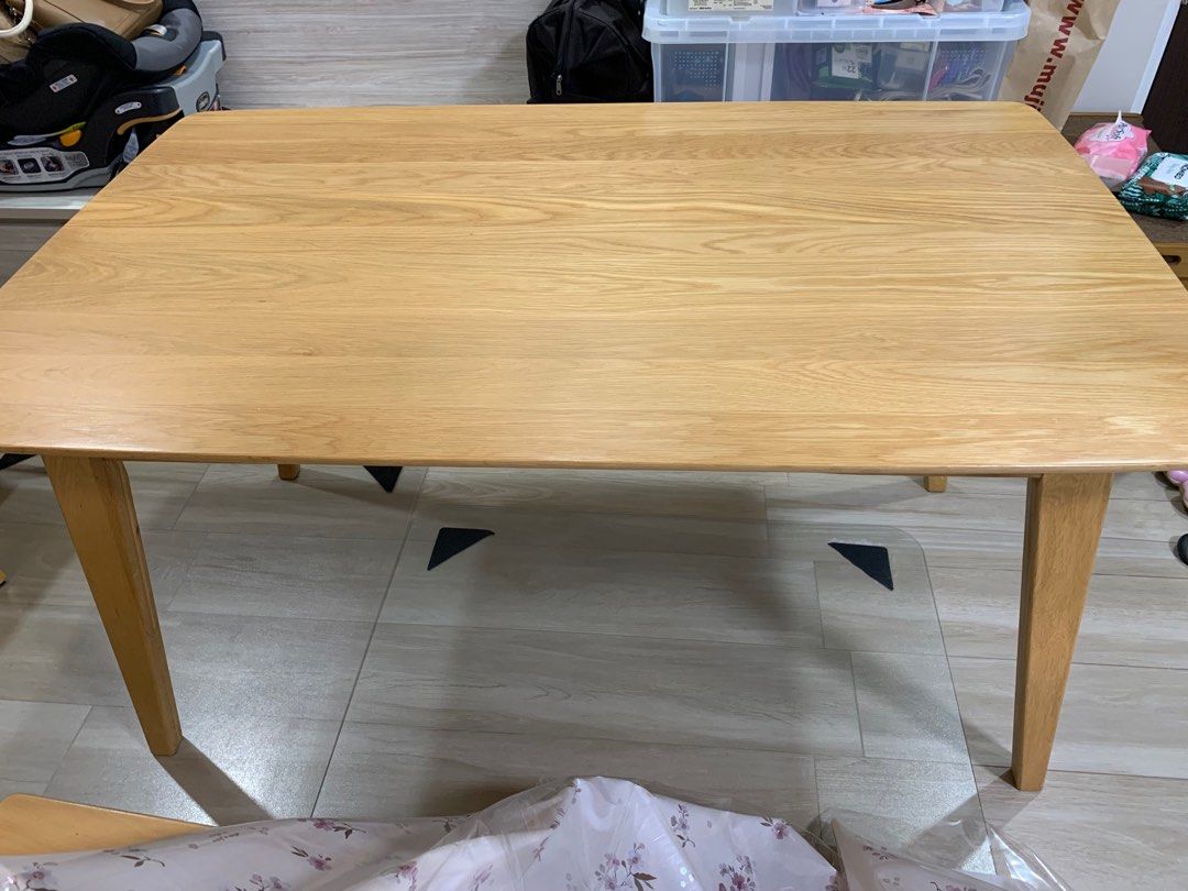 Solid Wood Dining Table (Category: Tables & Sets) located in Singapore. Submitted by nickyname (Listing ID 1296312493, Image 3). Description: Great condition as always used with table cloth Self-collect.