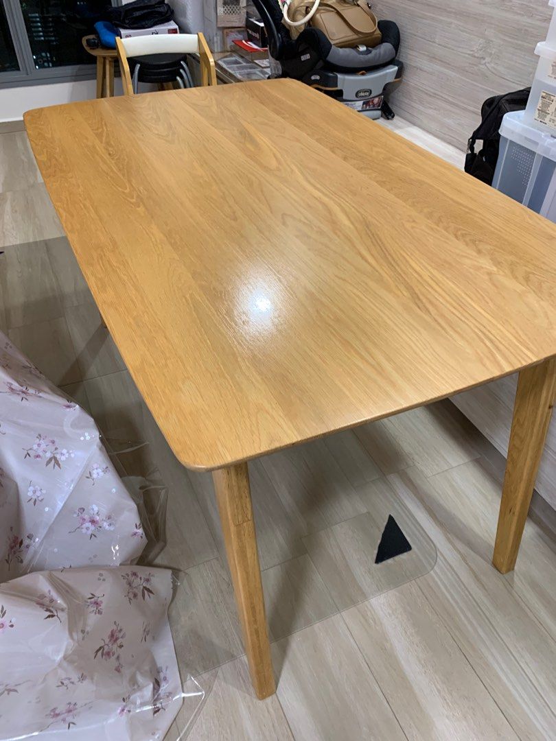 Solid Wood Dining Table (Category: Tables & Sets) located in Singapore. Submitted by nickyname (Listing ID 1296312493, Image 1). Description: Great condition as always used with table cloth Self-collect.