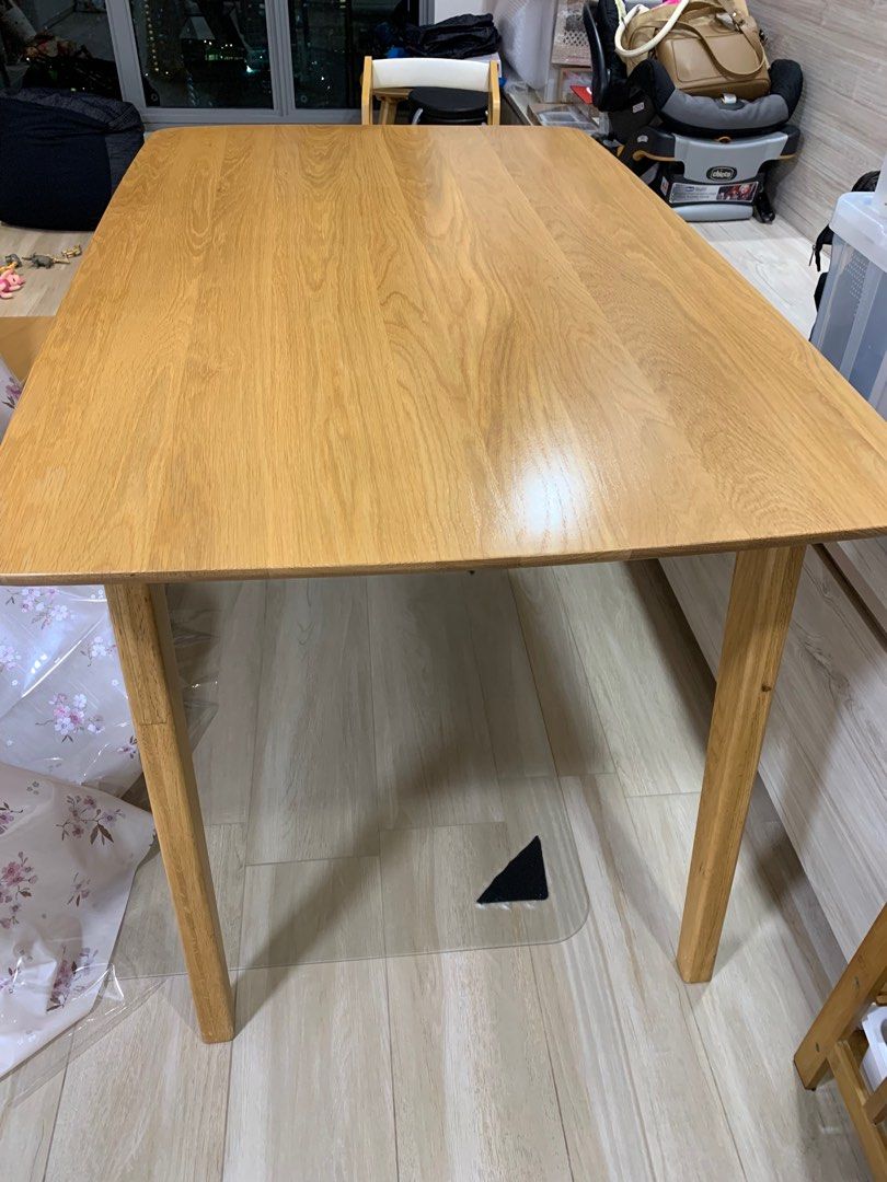 Solid Wood Dining Table (Category: Tables & Sets) located in Singapore. Submitted by nickyname (Listing ID 1296312493, Image 2). Description: Great condition as always used with table cloth Self-collect.