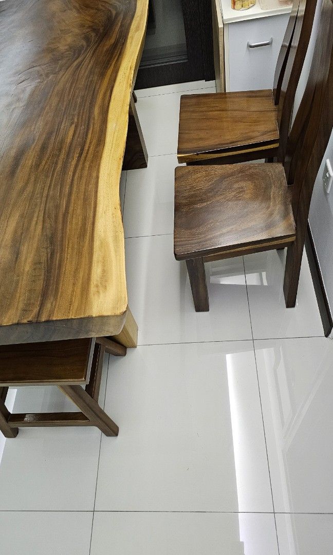 Solid Wood Dining Table (Category: Tables & Sets) located in Singapore. Submitted by chaopuliao43056 (Listing ID 1296390140, Image 3). Description: The dinning table set comes with 5 chairs beside this dining table, I also have one set of 1) Solid wood tea table with 5 chairs, selling at $1,000..