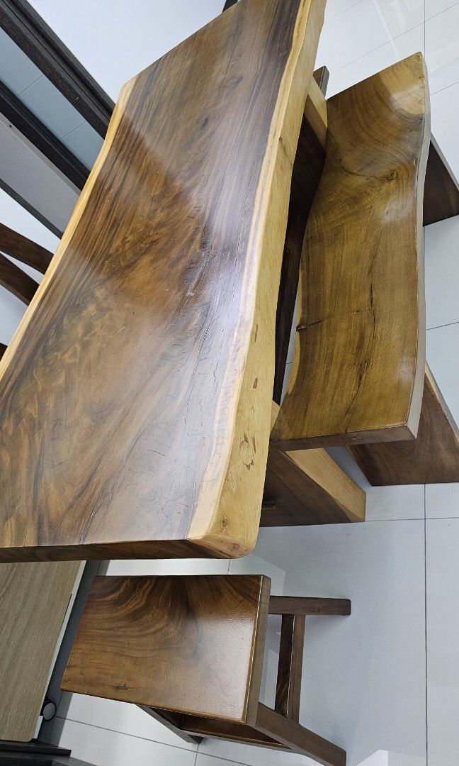 Solid Wood Dining Table (Category: Tables & Sets) located in Singapore. Submitted by chaopuliao43056 (Listing ID 1296390140, Image 2). Description: The dinning table set comes with 5 chairs beside this dining table, I also have one set of 1) Solid wood tea table with 5 chairs, selling at $1,000..