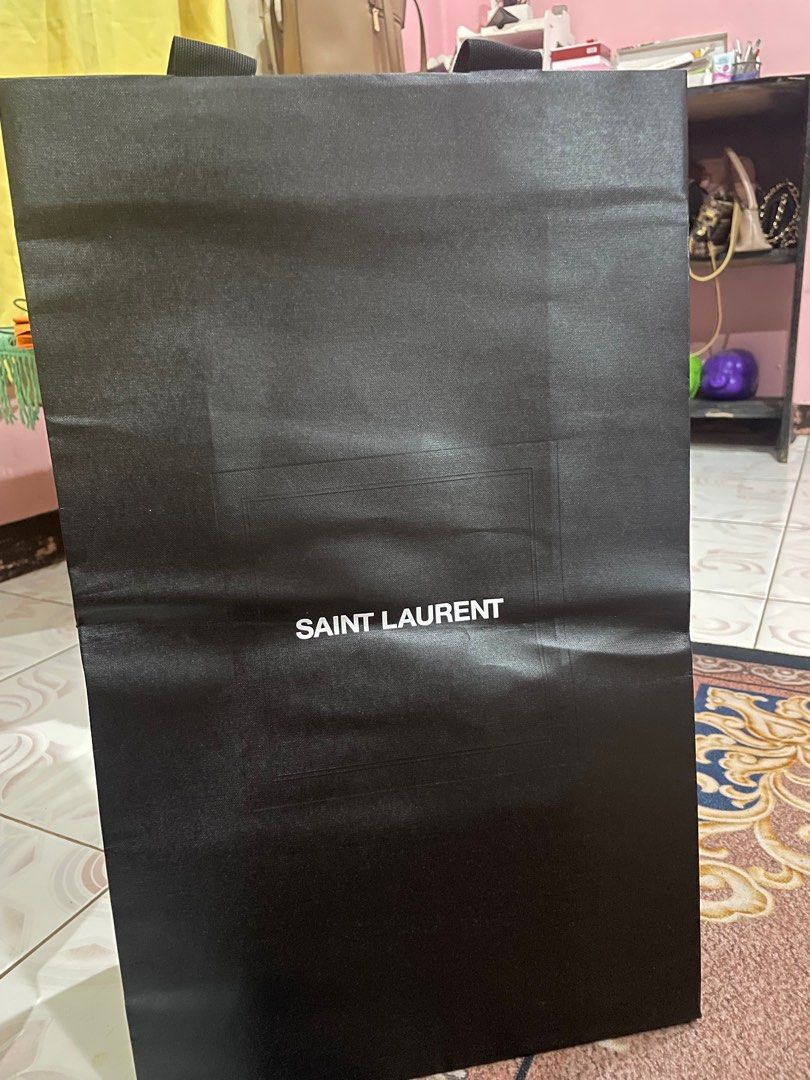YSL SAINT LAURENT PAPER BAG (Category: Luxury Accessories) located in Santa Rosa. Submitted by MISSEI. (Listing ID 1296346994, Image 1). Description: 20.5x12.5x6 inches.