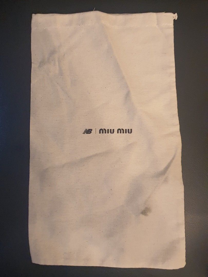 Authentic miu miu dust bag (Category: Luxury Bags & Wallets) located in Cavite. Submitted by ohmie23 (Listing ID 1299257749, Image 1). Description: Authentic miu miu dust bag dimes 14x8 inch.