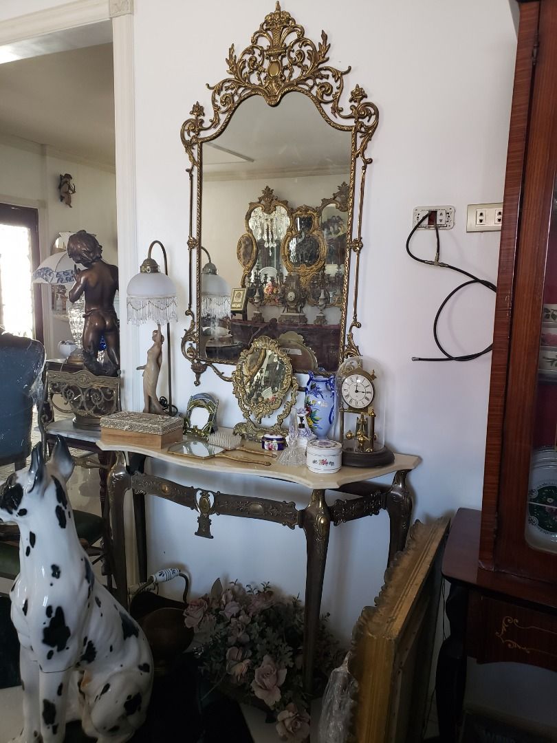 Brass Console table and Mirror (Category: Tables & Sets) located in Mandaluyong City. Submitted by cherishla (Listing ID 1299129814, Image 1). Description: Brass console table and mirror. Marbled top and intricately designed brass frames and legs. .
