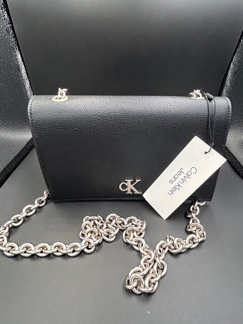 Calvin klein clutch wallet with sling Women s Fashion Bags Wallets Clutches on Carousell