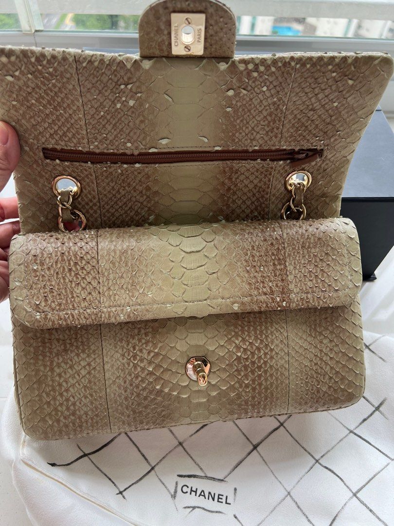 CHANEL PYTHON CLASSIC (Medium) (Category: Bags & Wallets) located in Singapore. Submitted by grace2610 (Listing ID 1299149336, Image 2). Description: 100% Authentic Purchased in Paris (2017) Size : Medium Double Flap Full Leather Gold Hardware Condition : exterior 9/10 (Used a few times and kept away in storage) interior 9.5/10 Comes with Authentication Card, Dust Bag (have yellow spots), Box (Slight Damage) NEGOTIABLE No Receipt Will not enterta