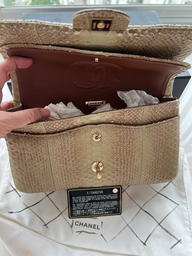 CHANEL PYTHON CLASSIC (Medium) (Category: Bags & Wallets) located in Singapore. Submitted by grace2610 (Listing ID 1299149336, Image 3). Description: 100% Authentic Purchased in Paris (2017) Size : Medium Double Flap Full Leather Gold Hardware Condition : exterior 9/10 (Used a few times and kept away in storage) interior 9.5/10 Comes with Authentication Card, Dust Bag (have yellow spots), Box (Slight Damage) NEGOTIABLE No Receipt Will not enterta