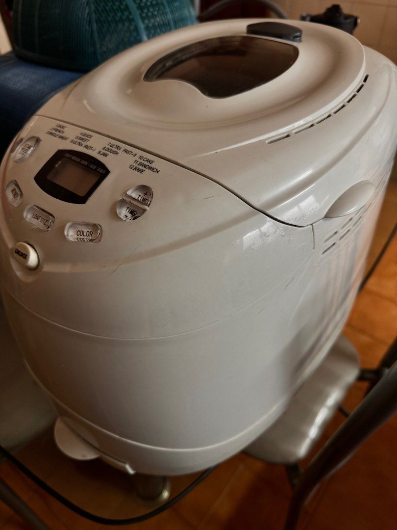Bread Maker (Category: Coffee Machines & Makers) located in Klang. Submitted by fakir21 (Listing ID 1299154945, Image 2). Description: Want to let go all this A.S.A.P.. still in working condition Bread Maker RM60 Walking Stick RM5.