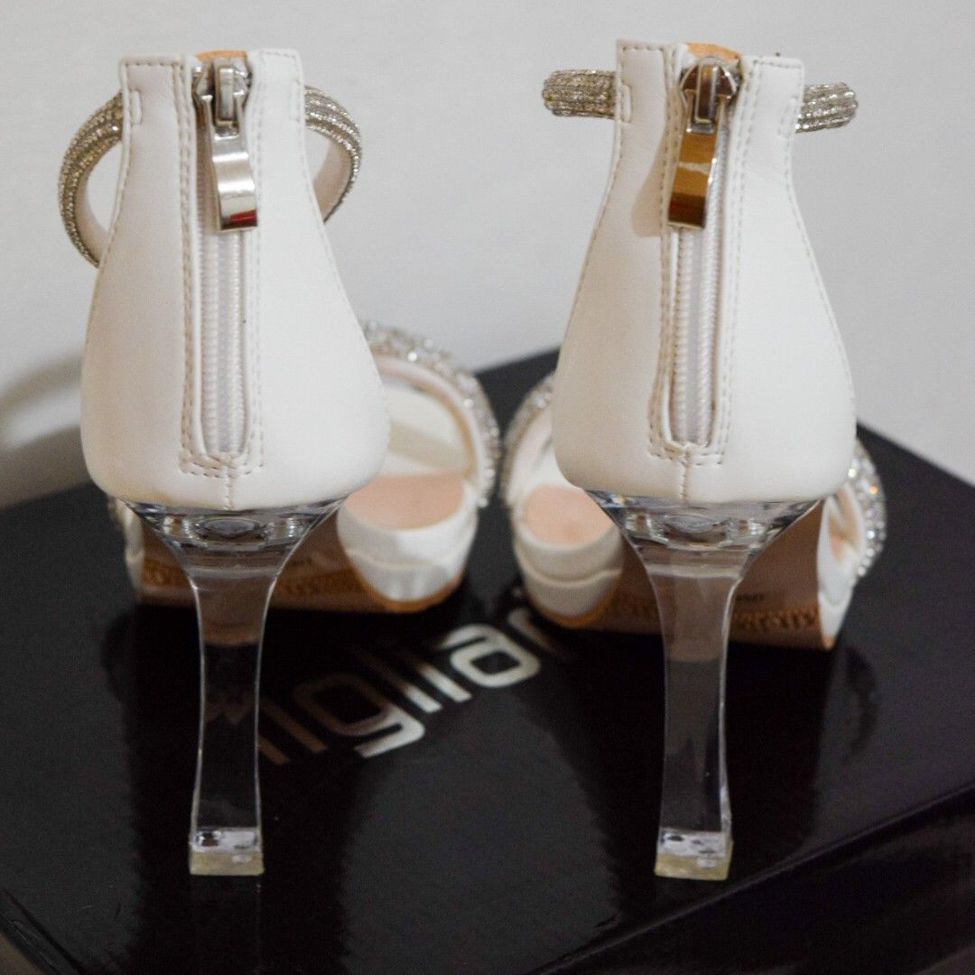 Figlia Iris Glass Heels Sandals (Category: Heels) located in Caloocan City. Submitted by shopfab. (Listing ID 1299149722, Image 3). Description: Adorned with sparkling embellished straps and stunning glass heels ✨ 100% Authentic Figlia Material: Synthetic Leather upper Heel Height: 3.7 Inches ▫️Used once for wedding reception.