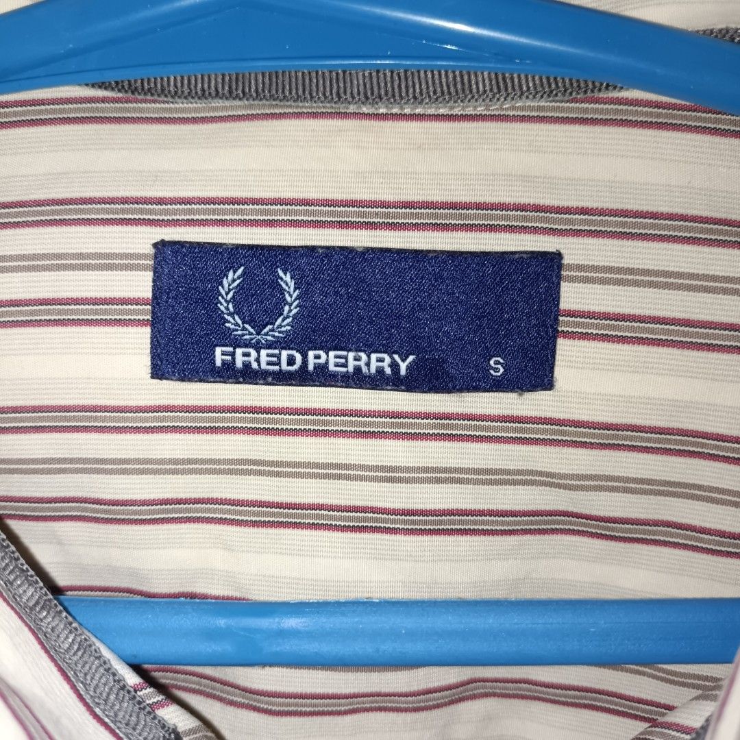 Fred Perry Plaid Button Down (Category: Luxury Apparel) located in General Santos City (Dadiangas). Submitted by Serde (Listing ID 1299168224, Image 3). Description: Fred Perry Plaid Button Down Small on tag but fit medium to semi large (19.5x28) Excellent like new Color rate: 10/10 Issue: small bleach kakulay sa damit kaya barely noticeable. see last pic.