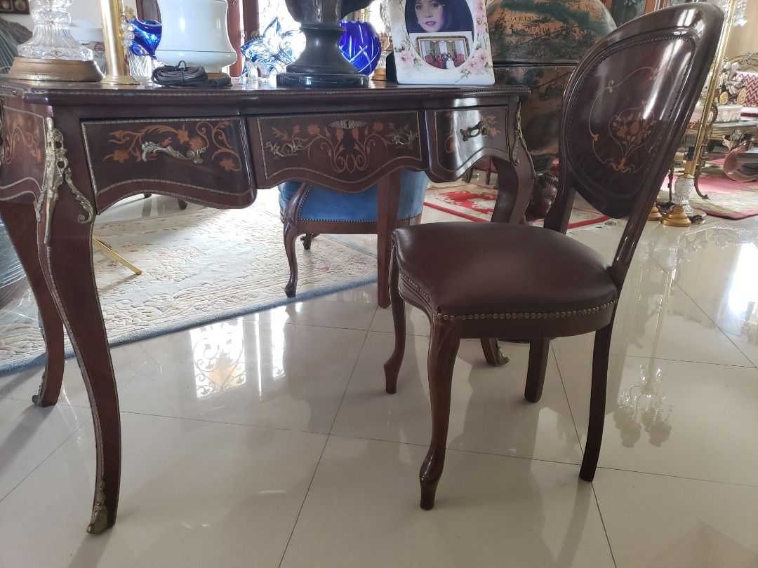 Victorian Office Table (Category: Tables & Sets) located in Mandaluyong City. Submitted by cherishla (Listing ID 1299118397, Image 1). Description: Imported Victorian -style office table, small in size that is perfect for your cozy little office space. Built elegantly with brass appliques, very sexy legs. It has 3 spacious drawers. The middle drawer comes with a vintage lock and key to get that Victorian feel completely. Chair not included..