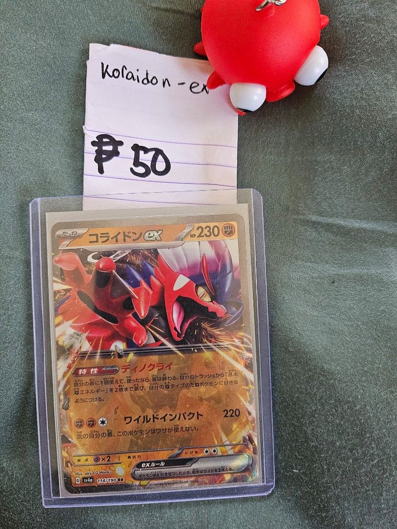 Assorted Pokemon cards with free sleeve (Category: Raw Singles) located in Pasig City. Submitted by hellobillie (Listing ID 1299301715, Image 1). Description: From Japan: Iron Threads EX - Php 50 Glimmora EX - Php 50 Koraidon EX - Php 50 Mew EX - Php 200 Others (English): Tapu Koko V - Php 150 Mewtwo V Star - Php 200 Charizard GX - Php 250 Radiant Greninja - Php 300 Galarian Zapdos V - Php 500 All cards NEAR MINT.