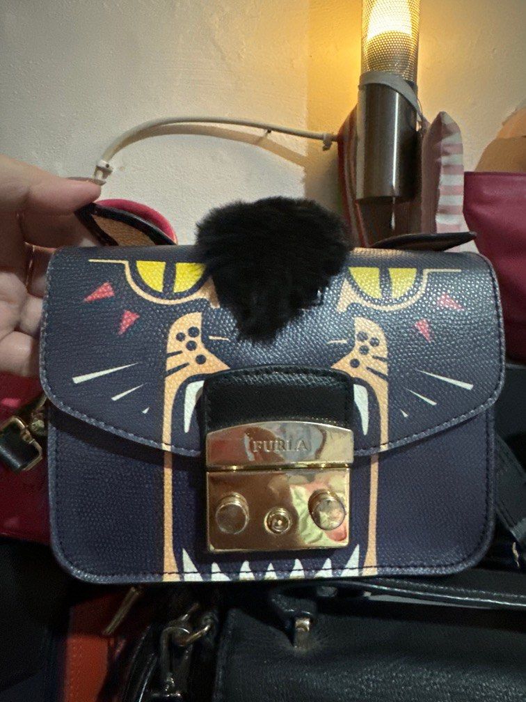 Furla tiger sales