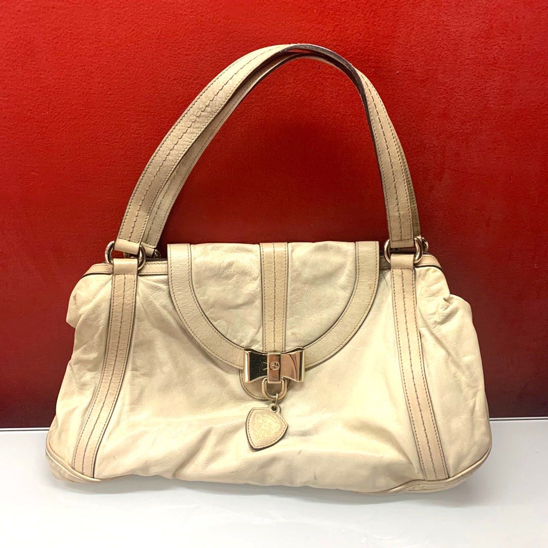 Gucci cream purse online